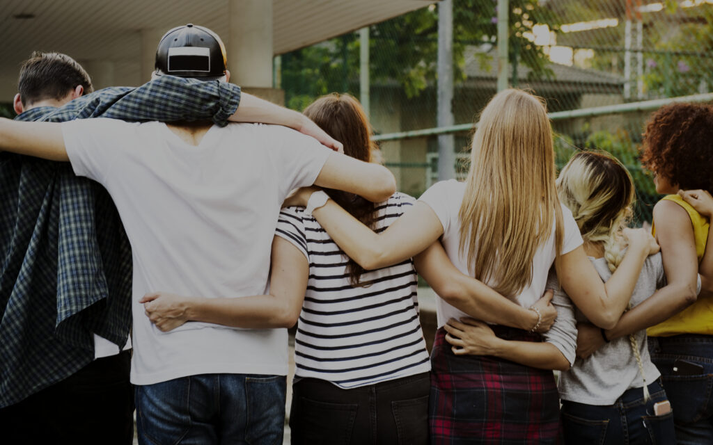 Group of teenagers from the back